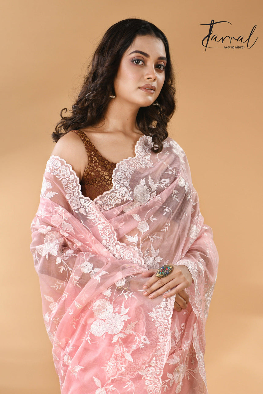Baby pink organza embroidered handloom saree closeup