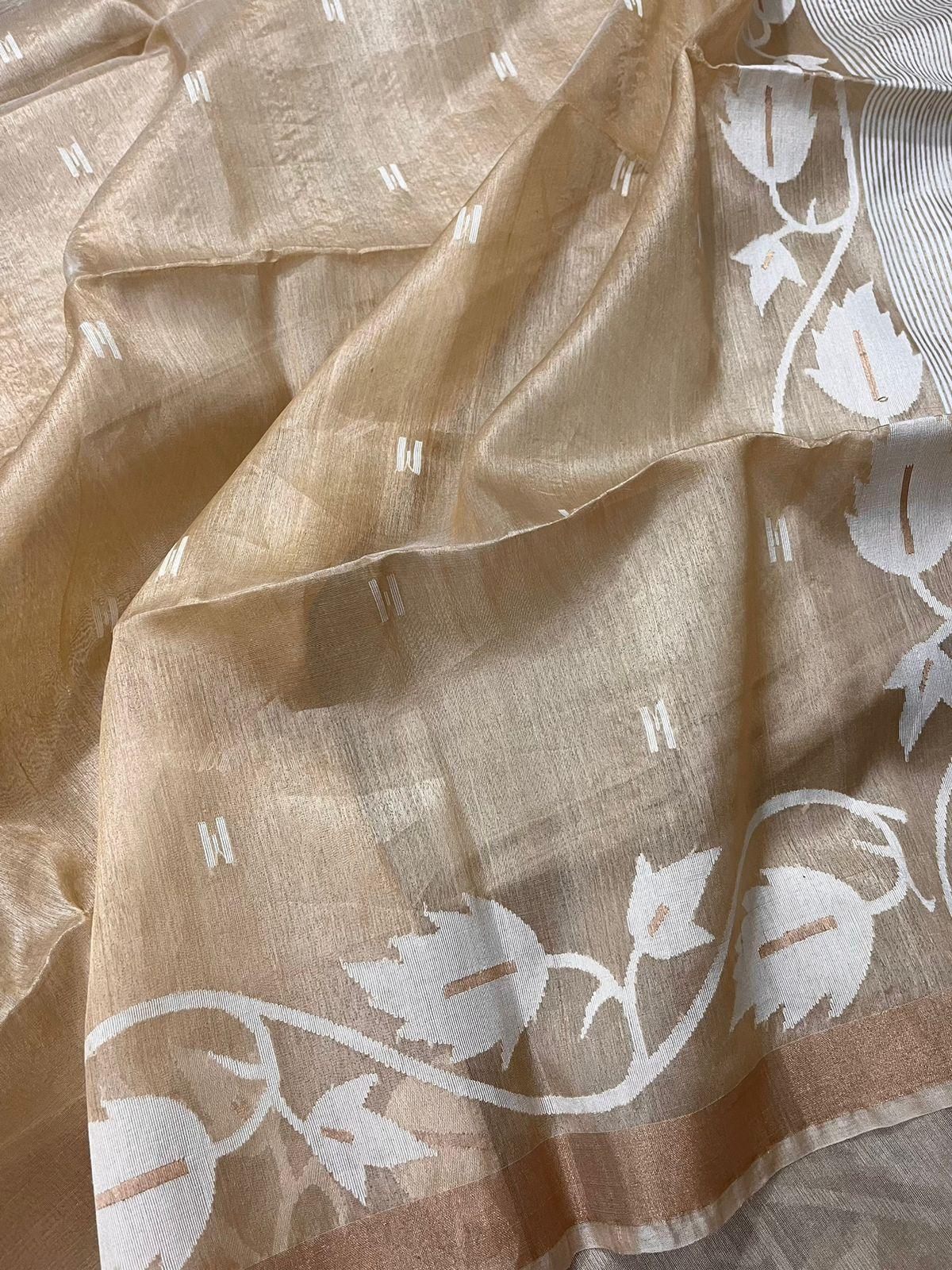 Beige colour with zari border & white floral motifs handwoven tussar silk jamdani saree - Tamal Boutique