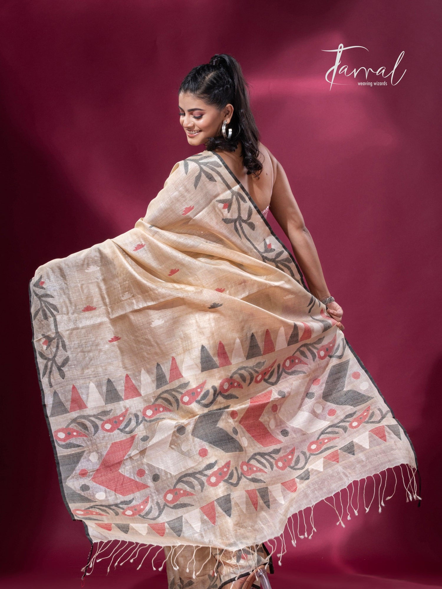 Beige with black floral border Tussar silk handwoven jamdani saree back