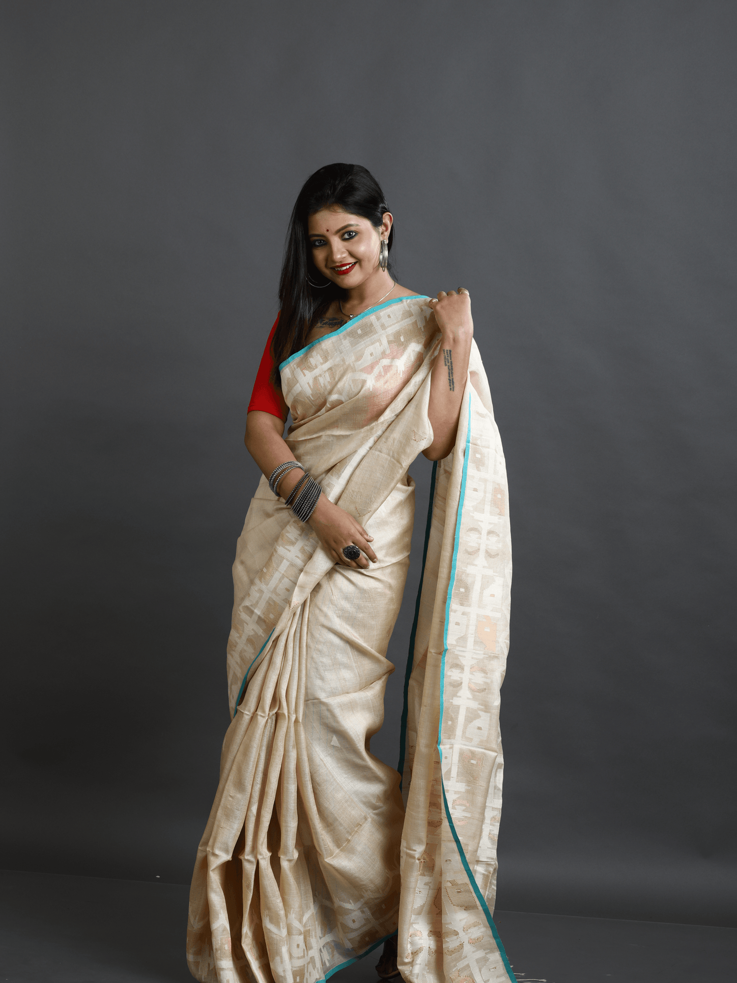 Beige with firoza border traditional handwoven jamdani saree in tusser silk - Tamal Boutique