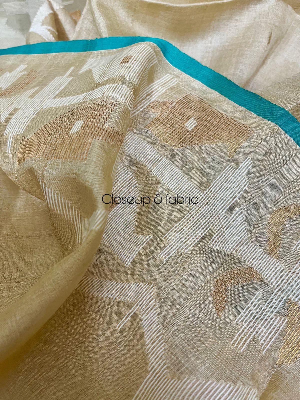 Beige with firoza border traditional handwoven jamdani saree in tusser silk - Tamal Boutique