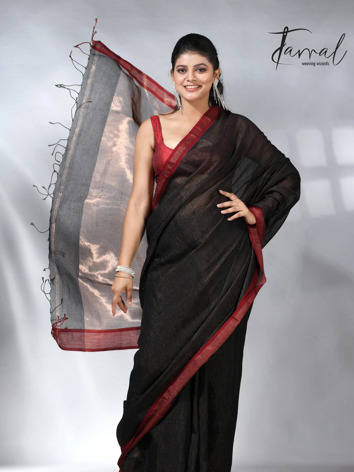 Black with red color border pure tissue linen handloom saree