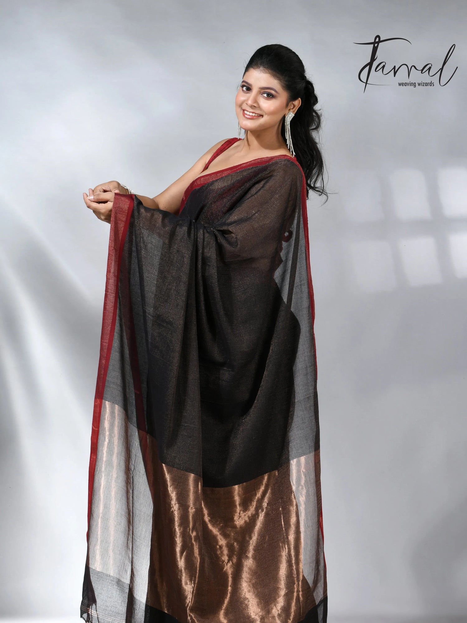 Black with red color border pure tissue linen handloom saree