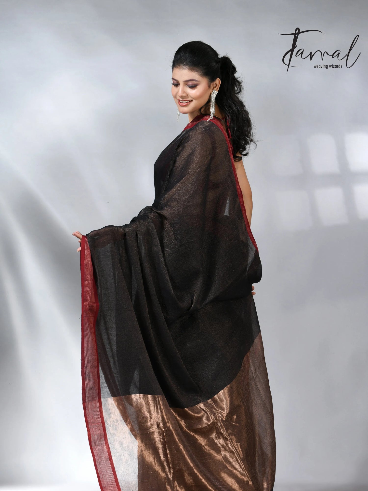 Black with red color border pure tissue linen handloom saree
