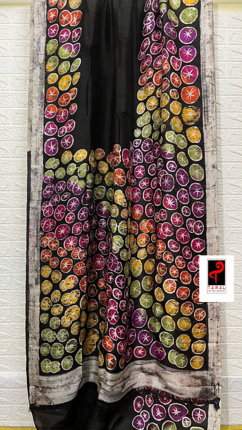 Black with multi colour water lily leaves motifs hand batik in katan silk saree