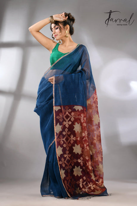 Blue handwoven Jamdani saree featuring a maroon star pallu