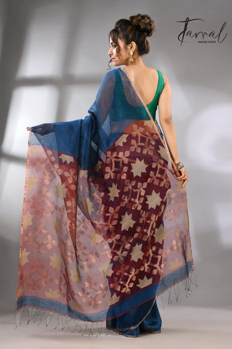 Blue handwoven Jamdani saree featuring a maroon star pallu back