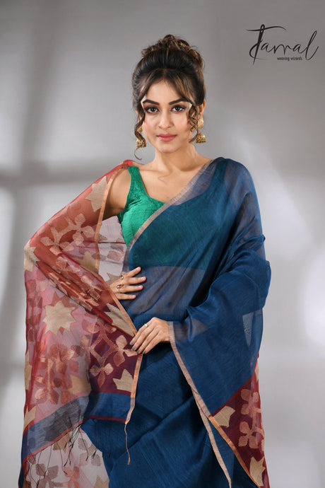 Blue handwoven Jamdani saree featuring a maroon star pallu full