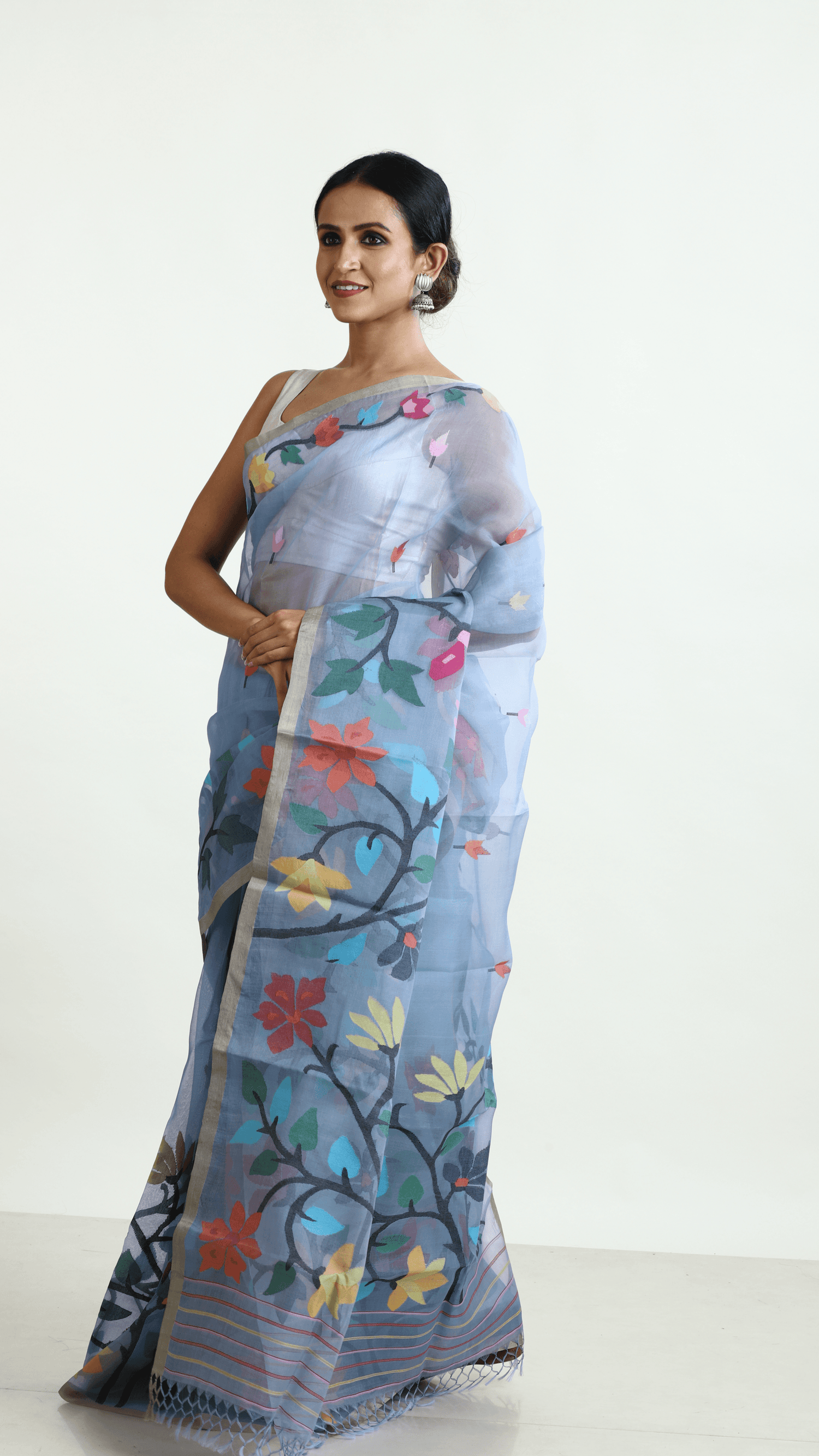 Blueish grey, jamdani saree, muslin silk,
handwoven, handwoven jamdani saree, floral border, clothing, boutique
