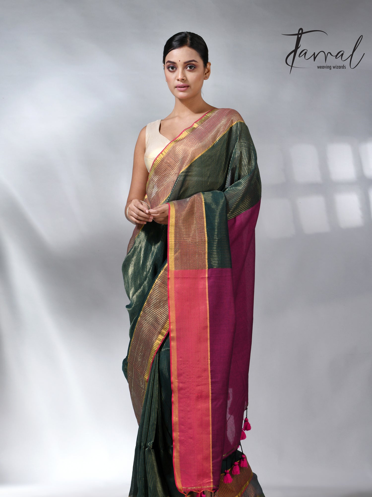 Bottle green with Rani pallu zari striped cotton handloom saree