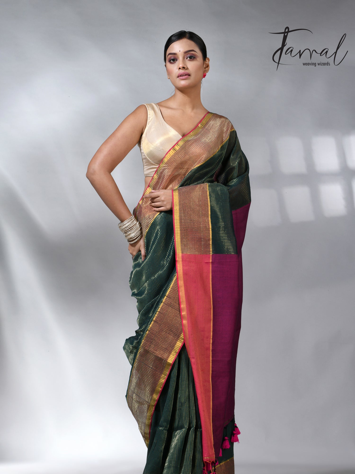 Bottle green with Rani pallu zari striped cotton handloom saree