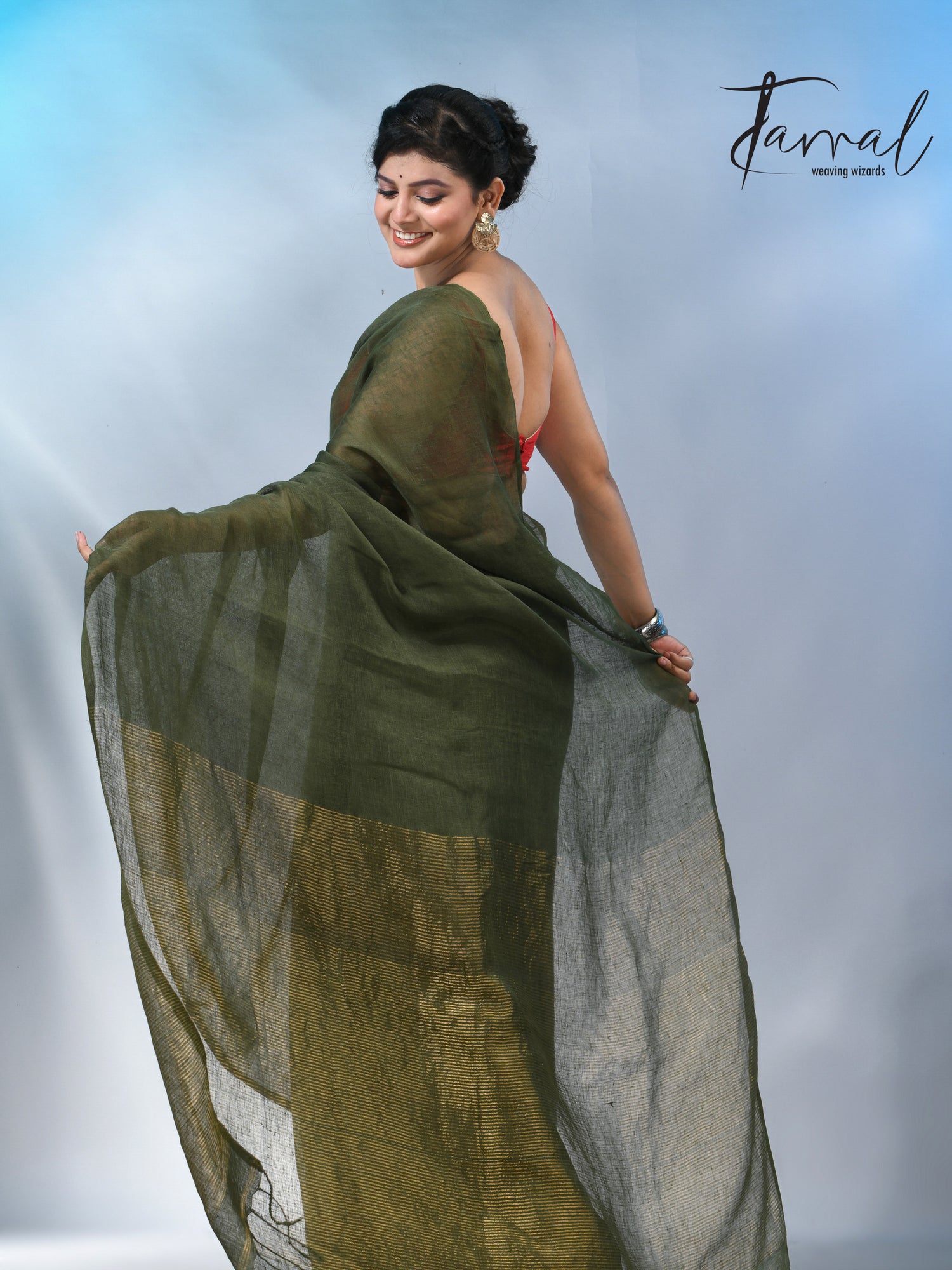 Bottle green with zari stripe pallu pure linen handloom saree