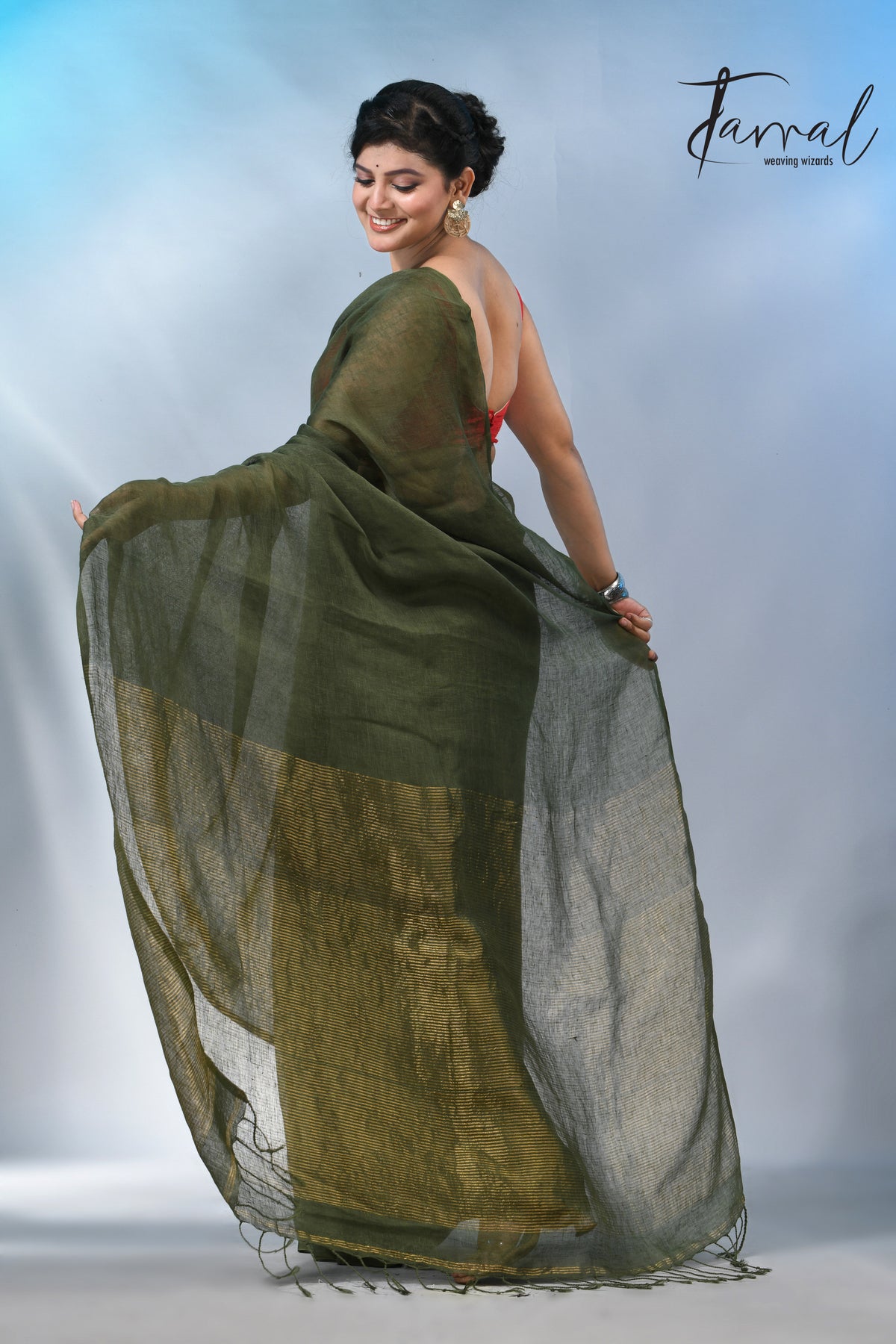 Bottle green with zari stripe pallu pure linen handloom saree