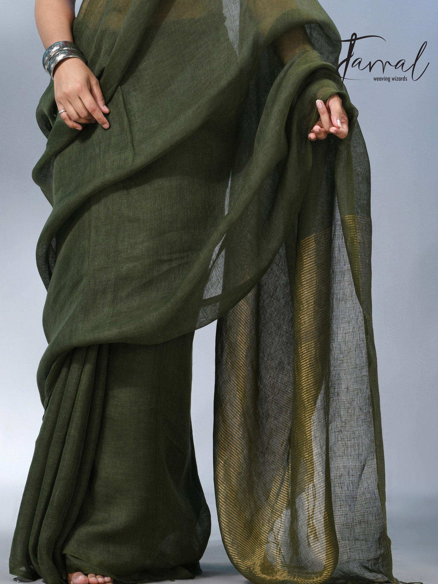 Bottle green with zari stripe pallu pure linen handloom saree