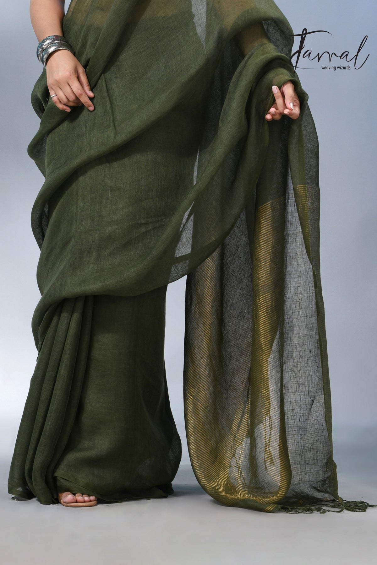 Bottle green with zari stripe pallu pure linen handloom saree