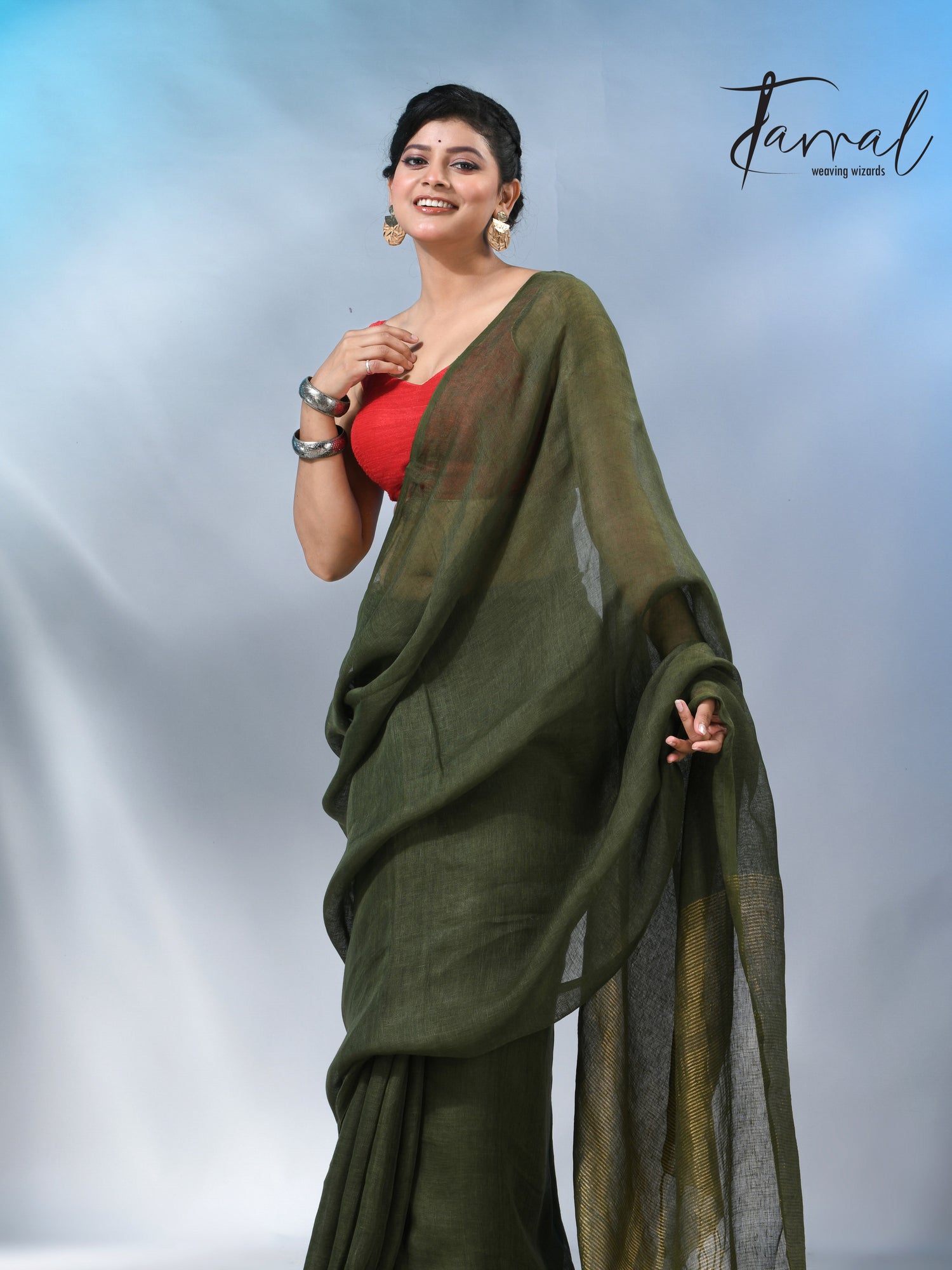 Bottle green with zari stripe pallu pure linen handloom saree