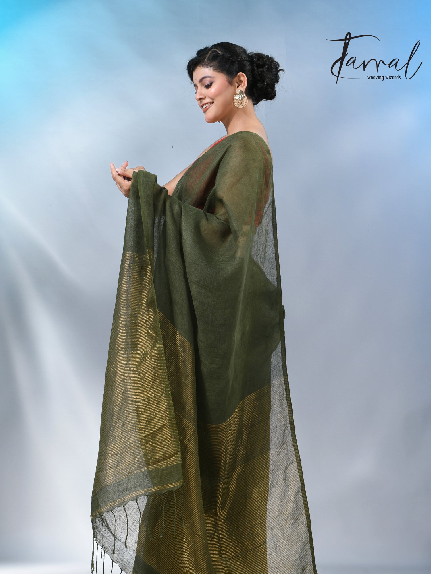 Bottle green with zari stripe pallu pure linen handloom saree