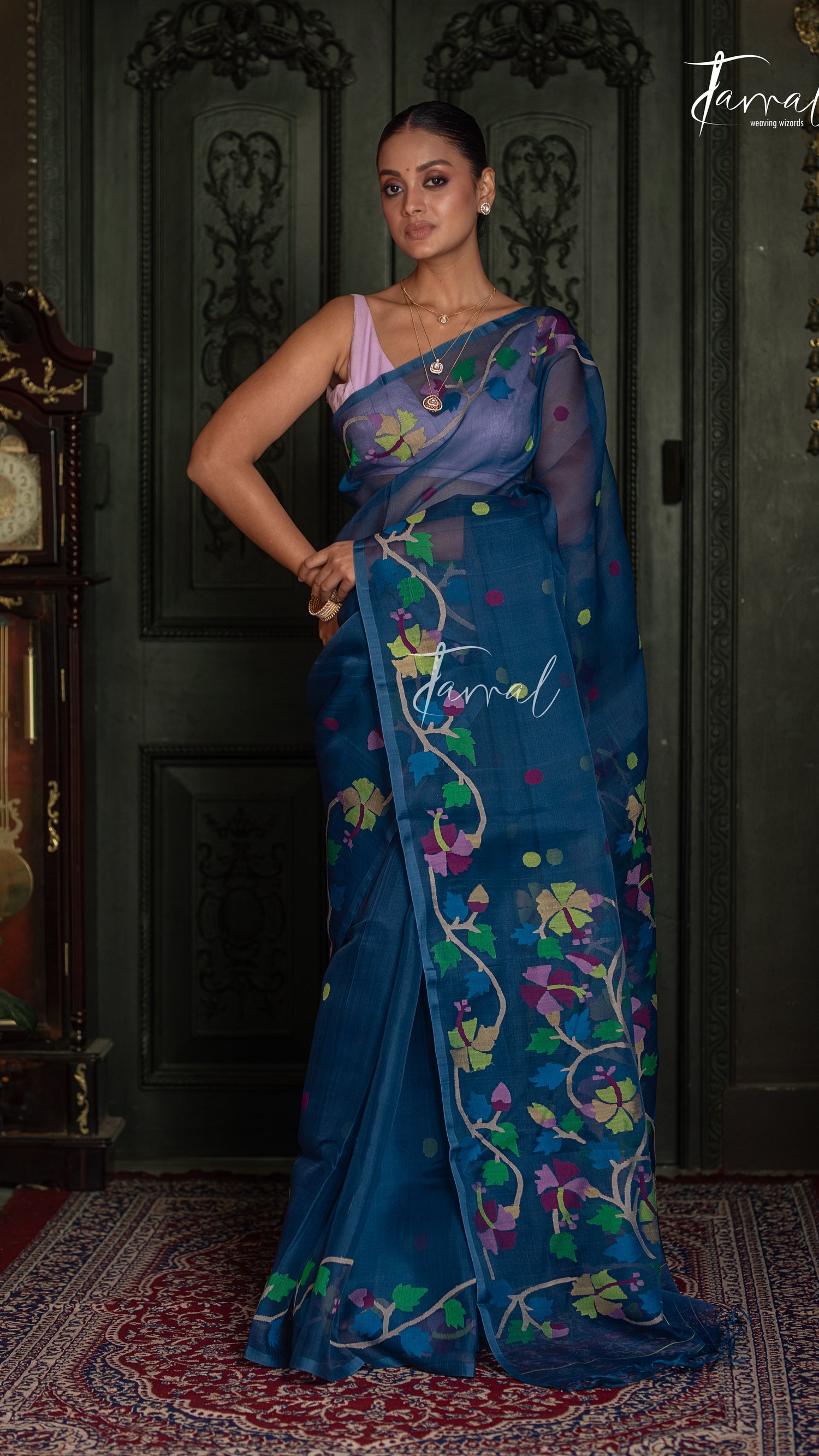 Teal Blue Handwoven Muslin Silk Jamdani Saree with Multicolour Floral Design