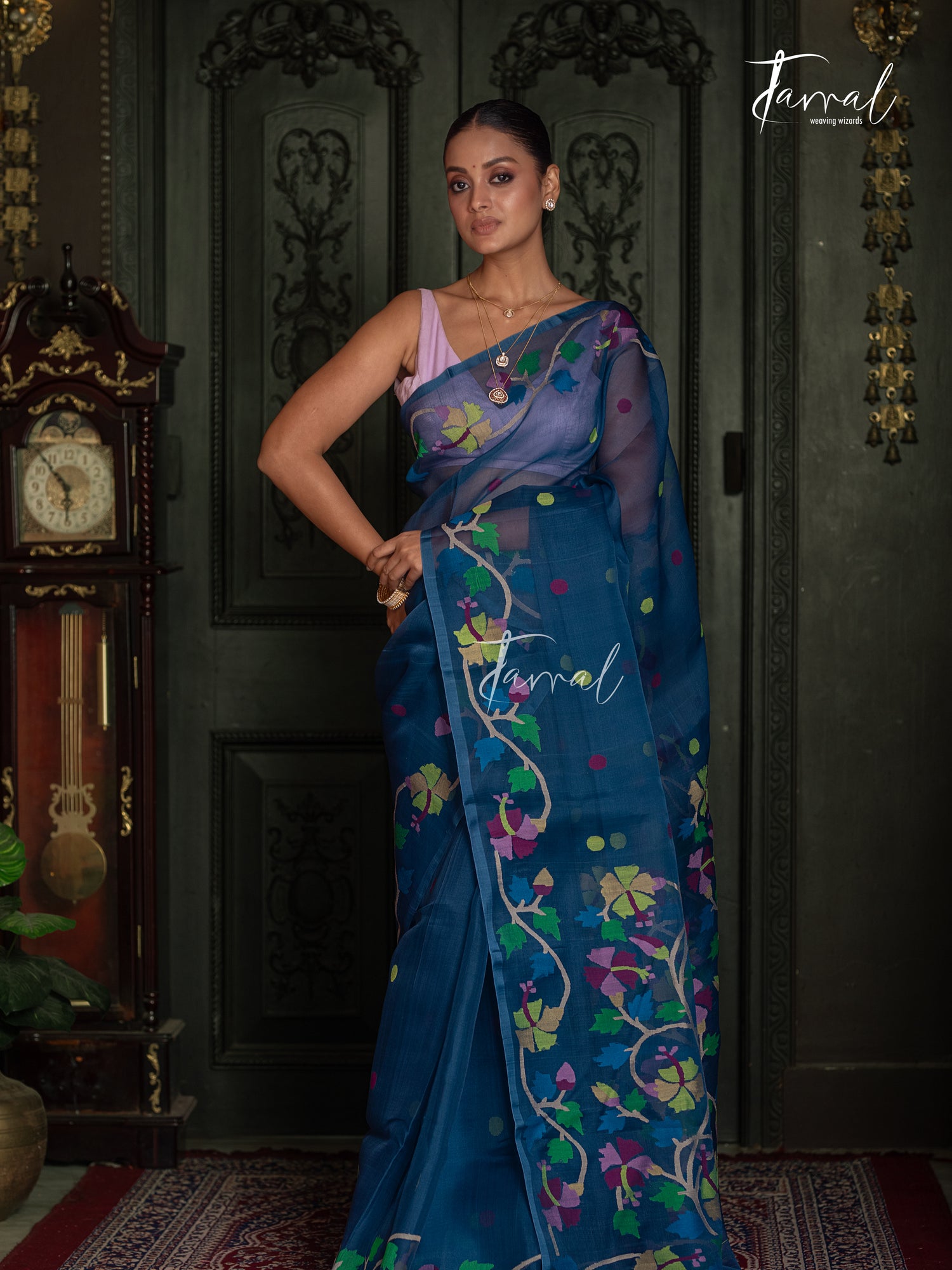 Teal Blue Handwoven Muslin Silk Jamdani Saree with Multicolour Floral Design