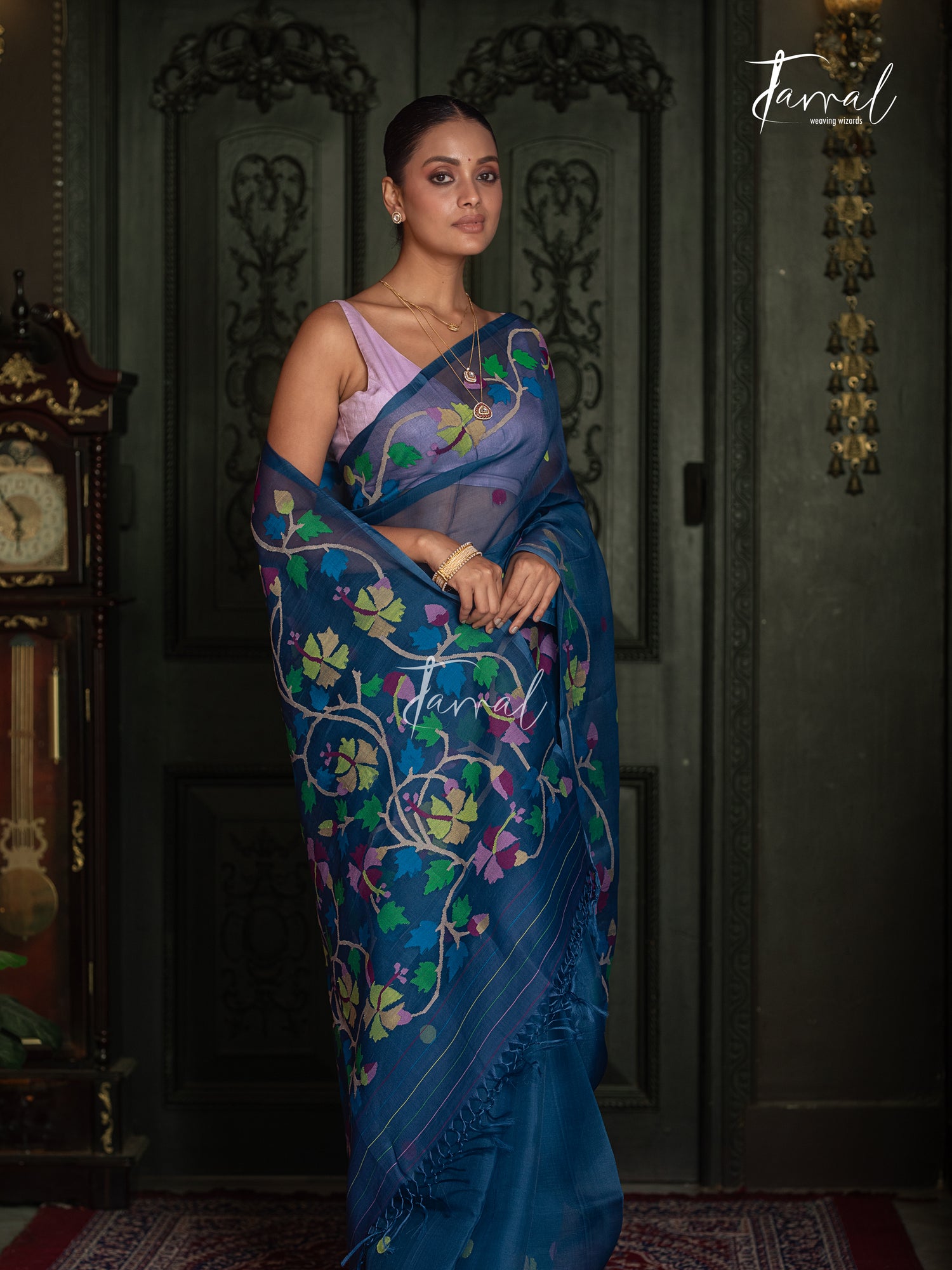 Teal Blue Handwoven Muslin Silk Jamdani Saree with Multicolour Floral Design