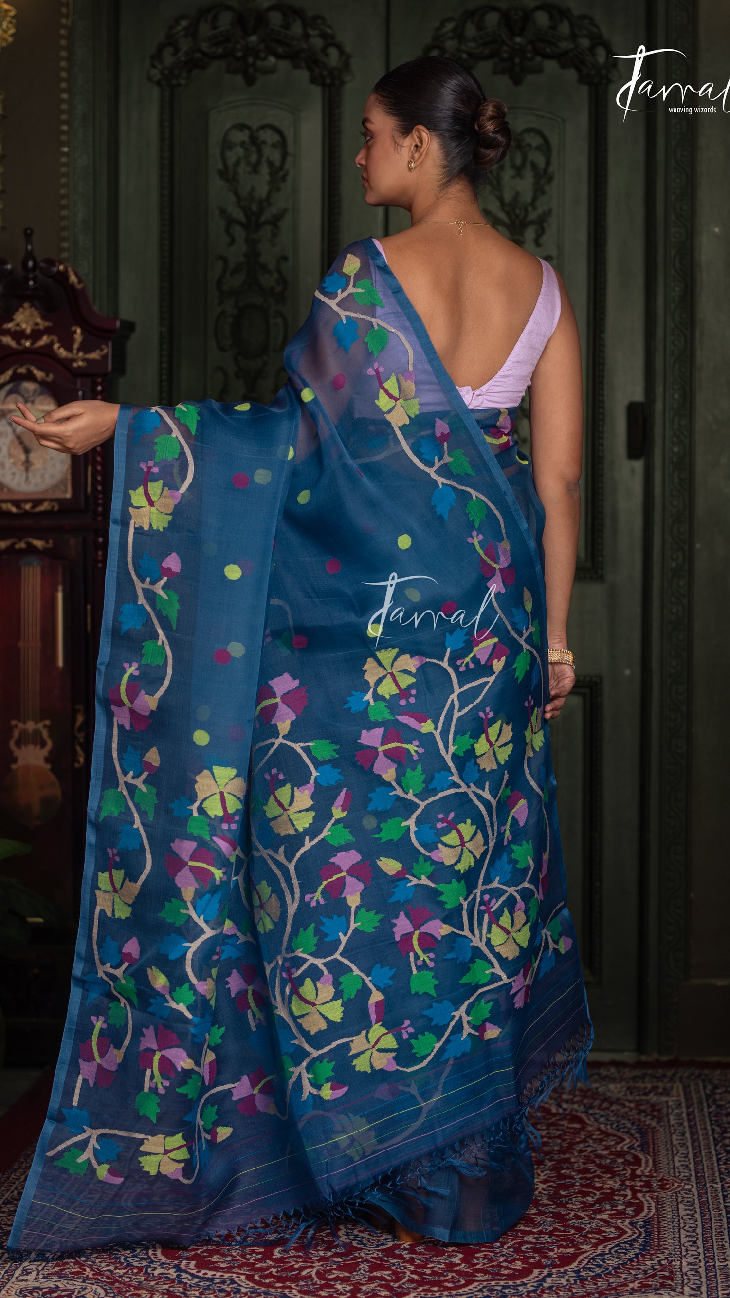 Teal Blue Handwoven Muslin Silk Jamdani Saree with Multicolour Floral Design