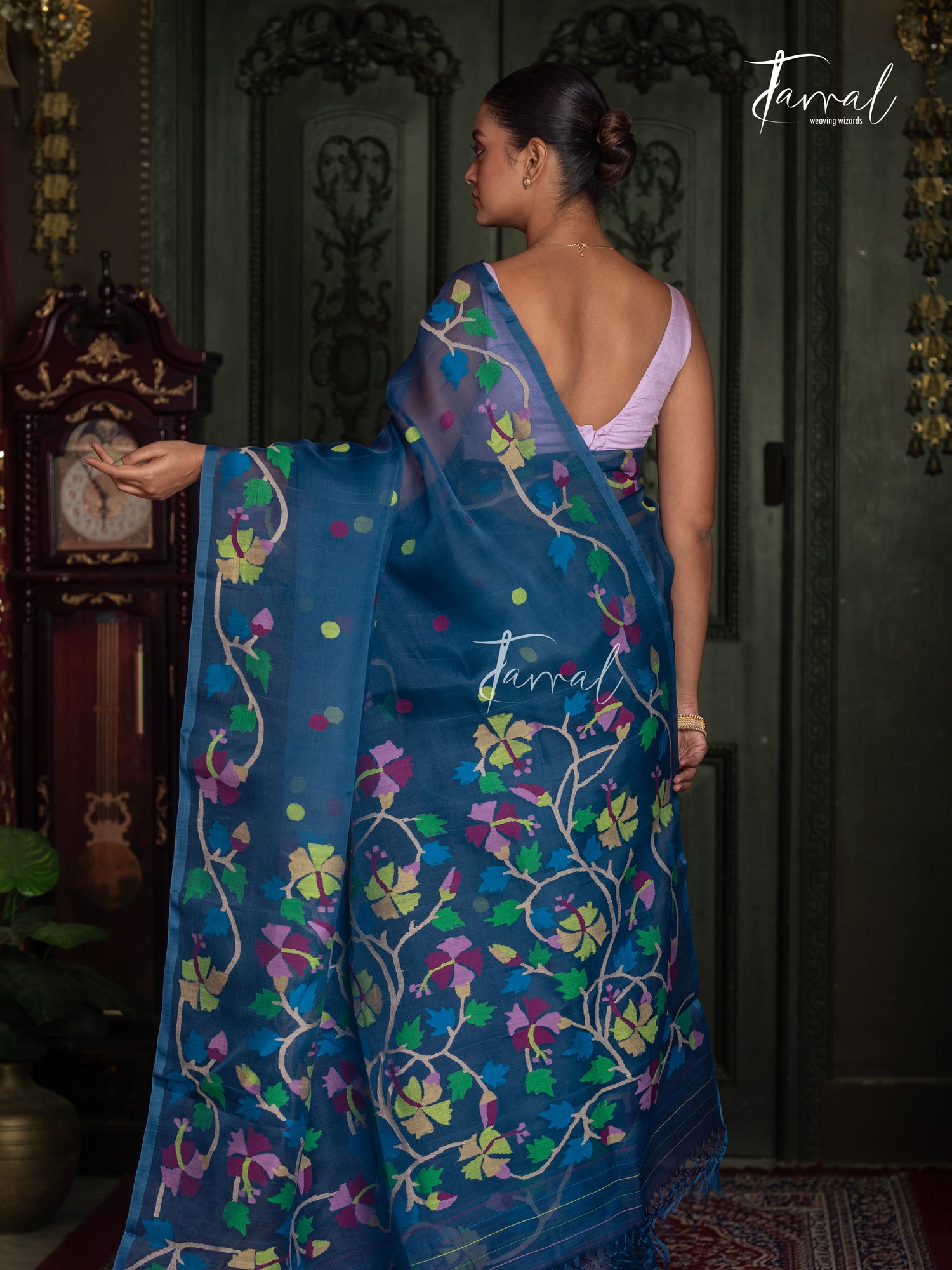 Teal Blue Handwoven Muslin Silk Jamdani Saree with Multicolour Floral Design