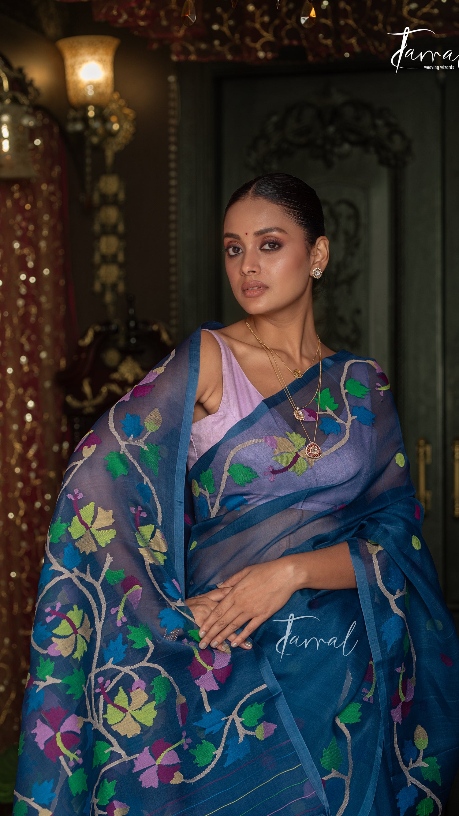 Teal Blue Handwoven Muslin Silk Jamdani Saree with Multicolour Floral Design