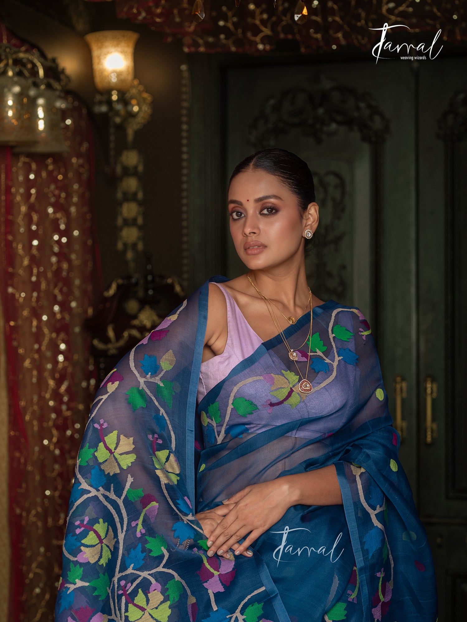 Teal Blue Handwoven Muslin Silk Jamdani Saree with Multicolour Floral Design