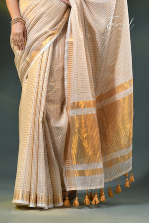 Offwhite golden zari striped mulmul cotton handloom saree