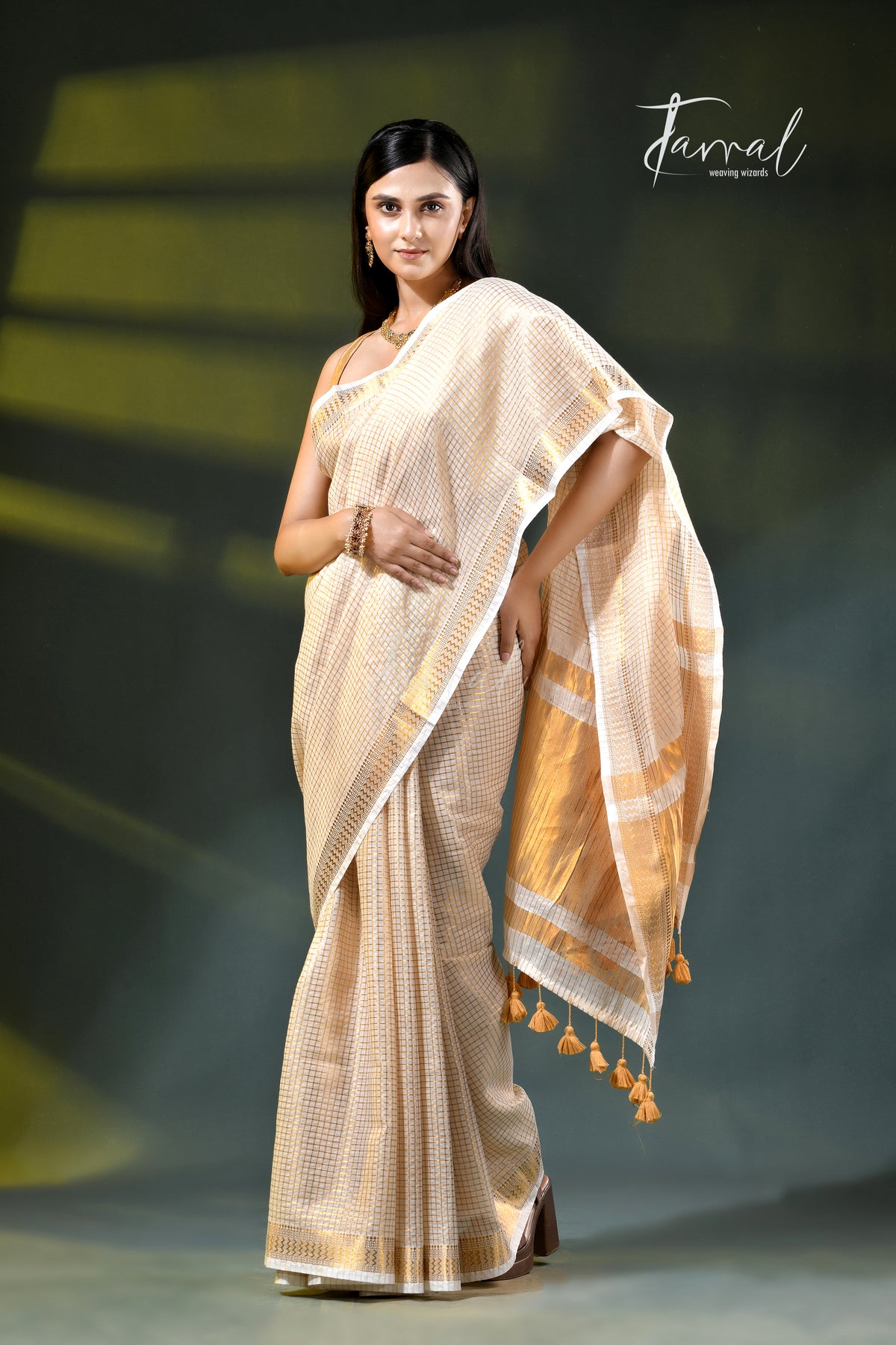 Offwhite golden zari striped mulmul cotton handloom saree