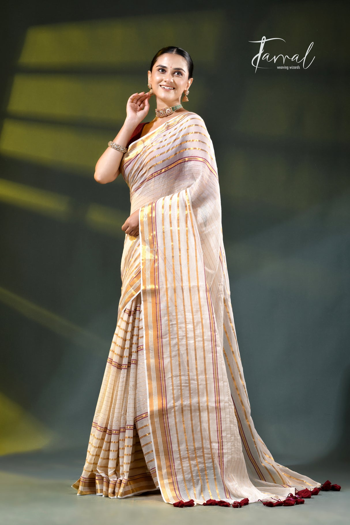 Offwhite with zari striped mulmul cotton handloom saree