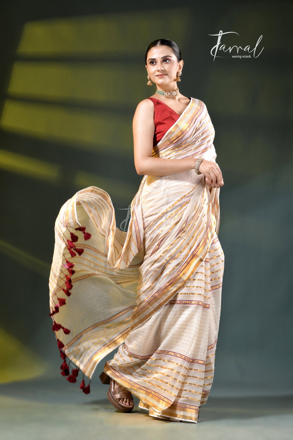 Offwhite with zari striped mulmul cotton handloom saree