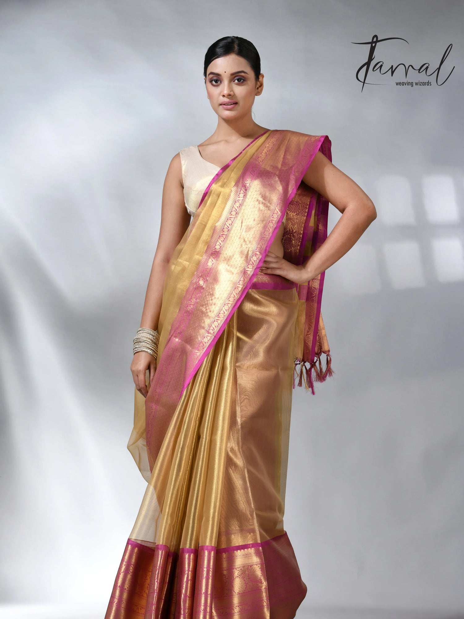 Exlore the Golden with the Pink colour in the Benarasi saree
