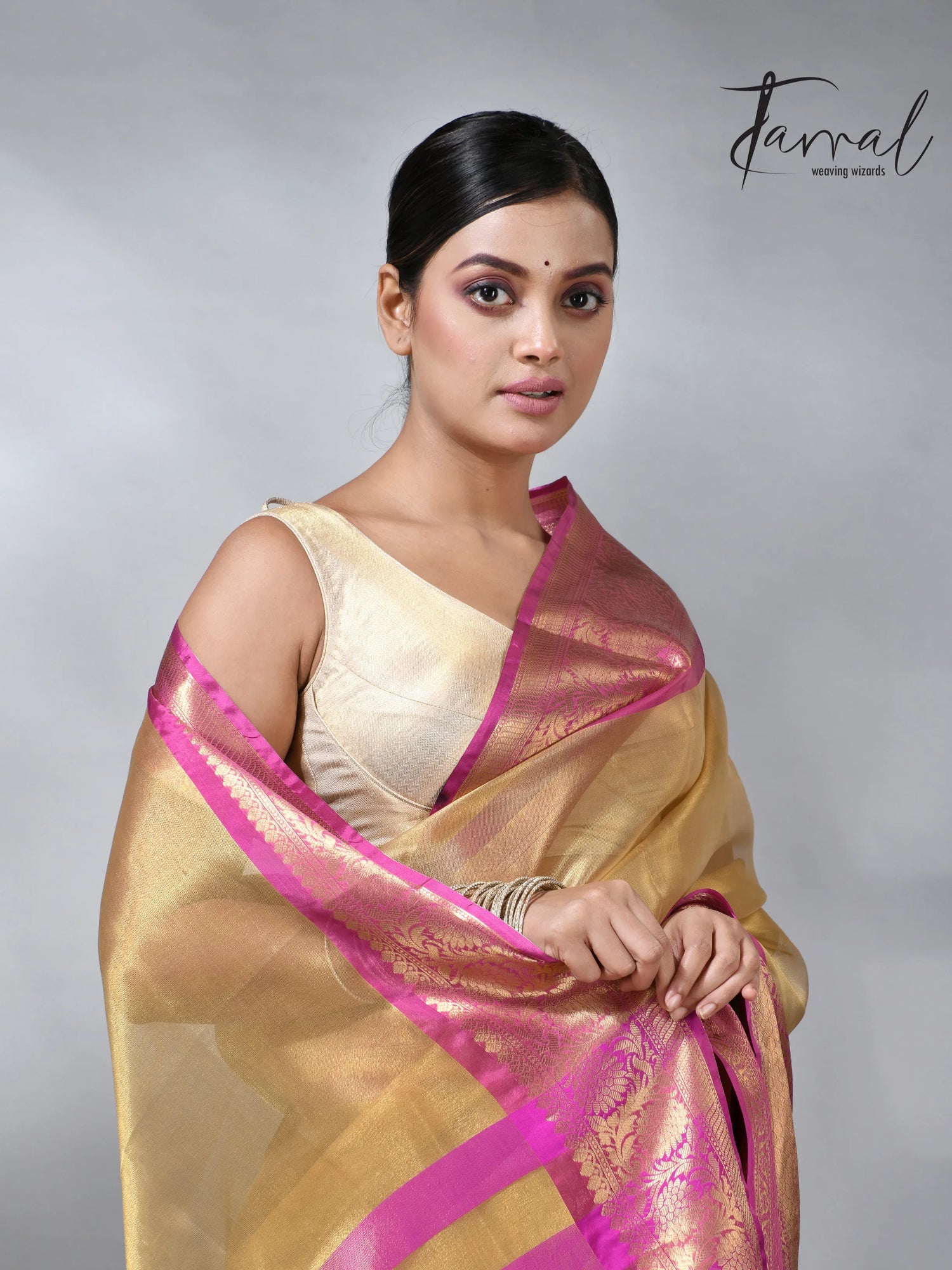 Exlore the Golden with the Pink colour in the Benarasi saree