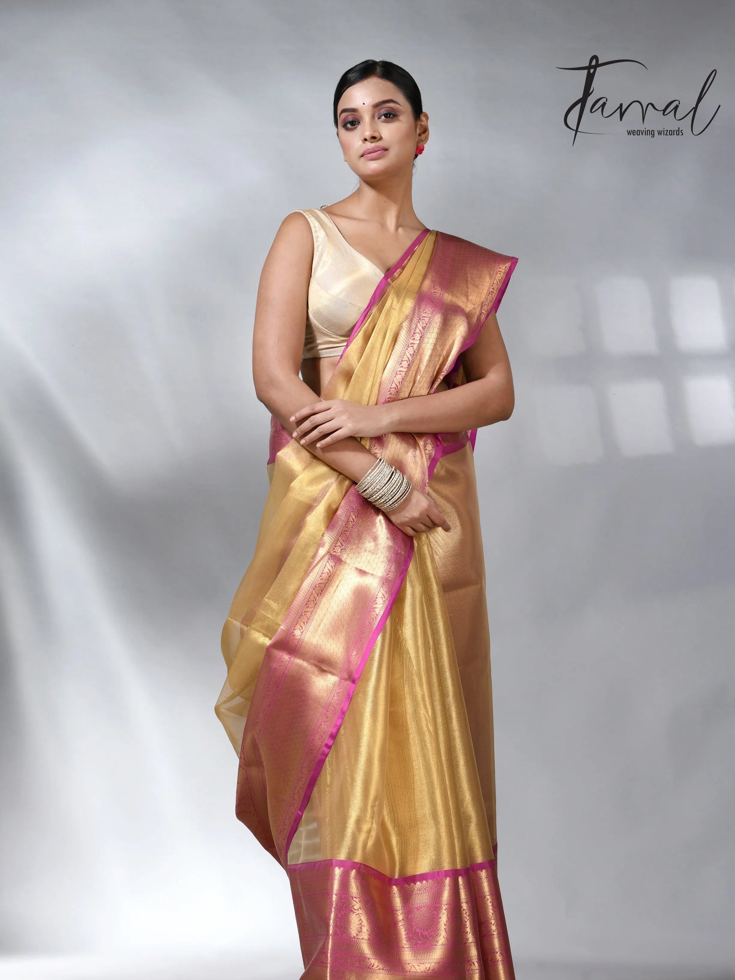 Exlore the Golden with the Pink colour in the Benarasi saree