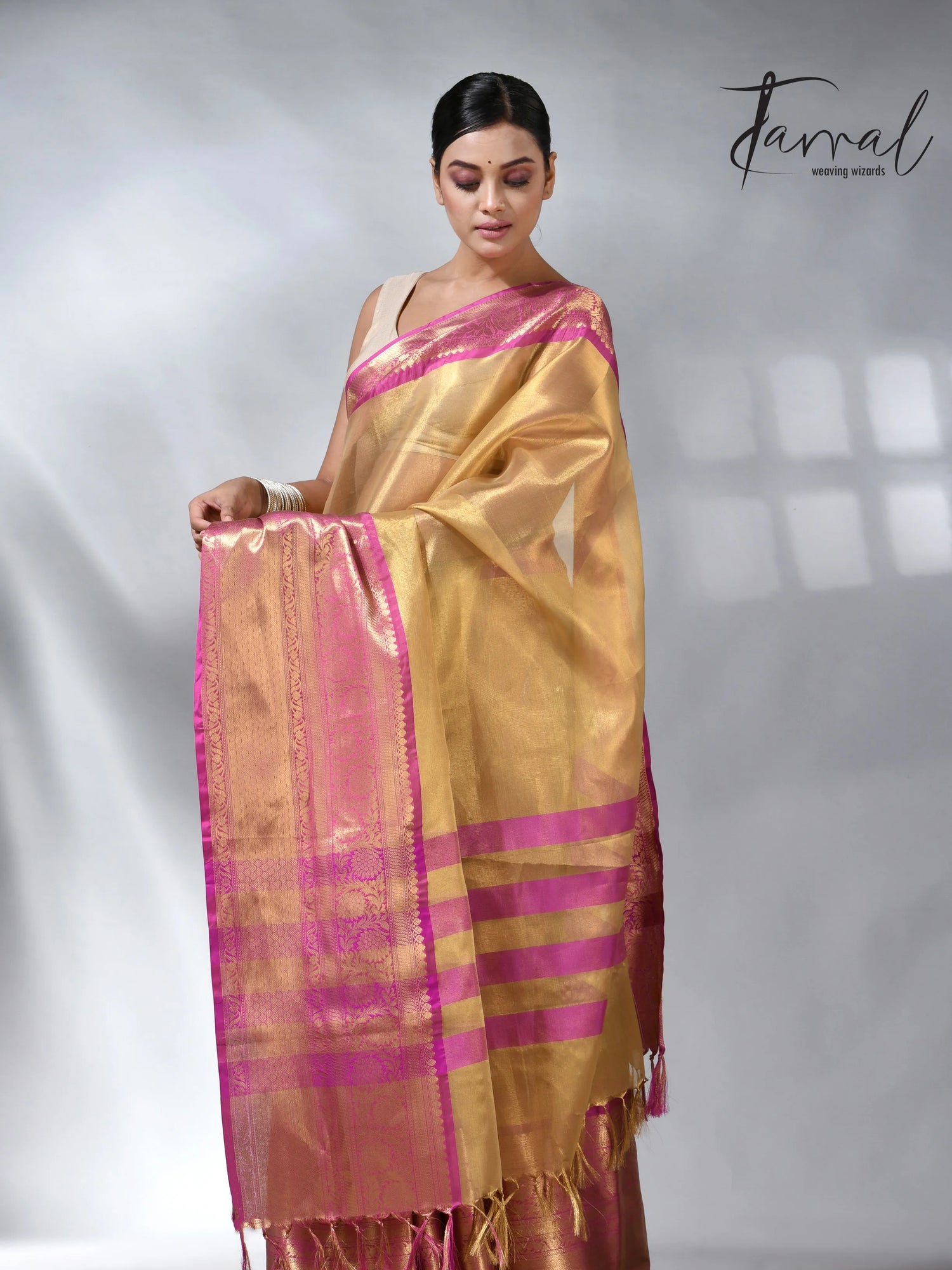 Exlore the Golden with the Pink colour in the Benarasi saree