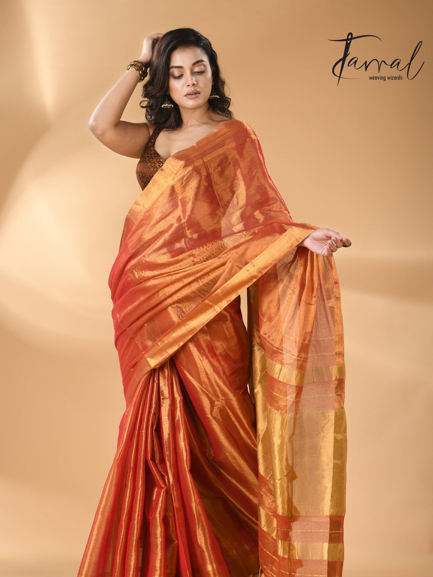 Golden orange tissue handloom saree front
