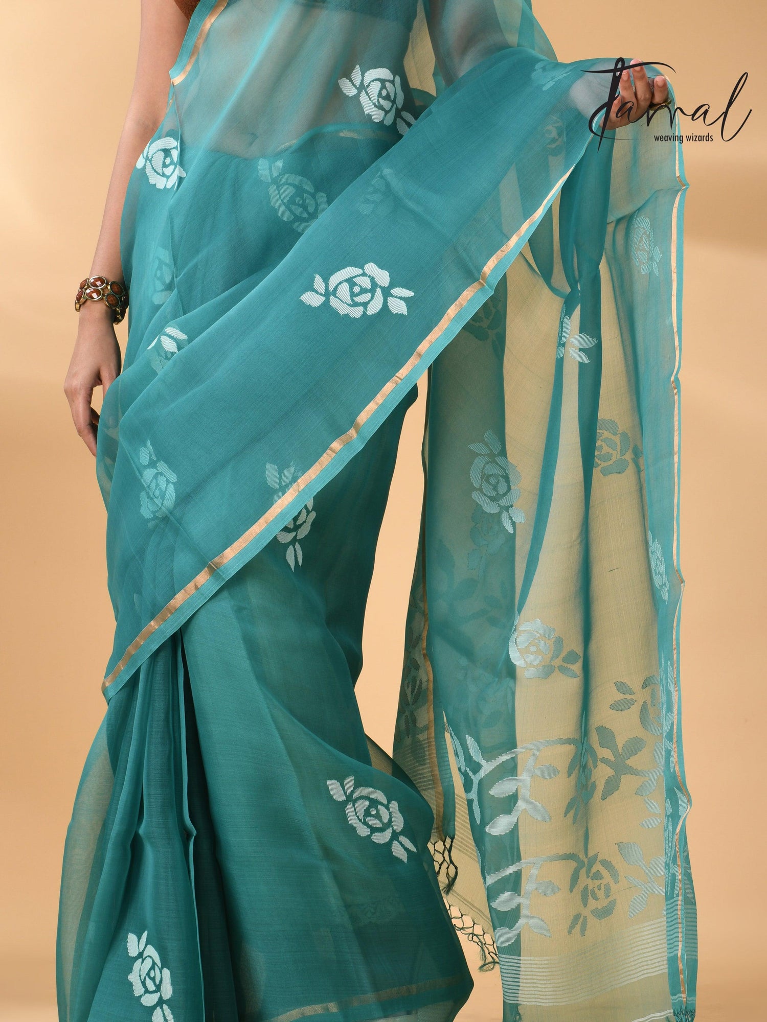 Handwoven needle work  muslin silk jamdani saree with teal blue motifs bottom