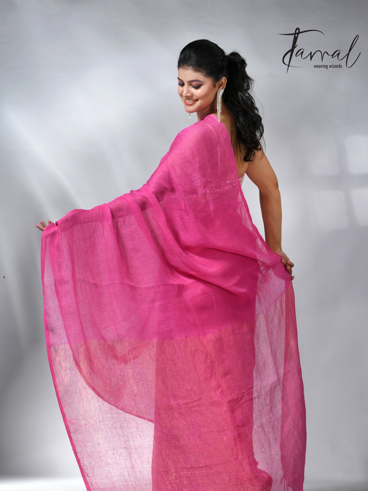 Hot pink with golden zari stripe pallu linen handloom saree