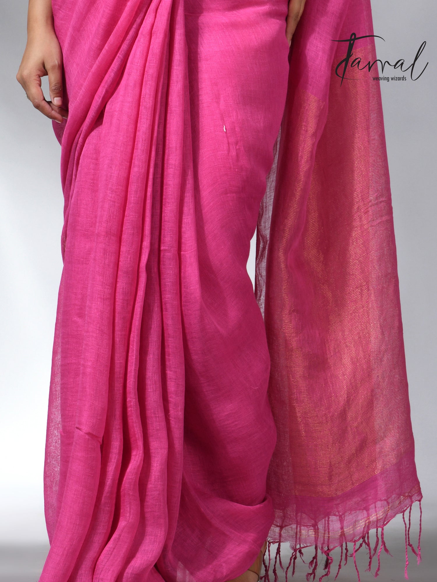 Hot pink with golden zari stripe pallu linen handloom saree