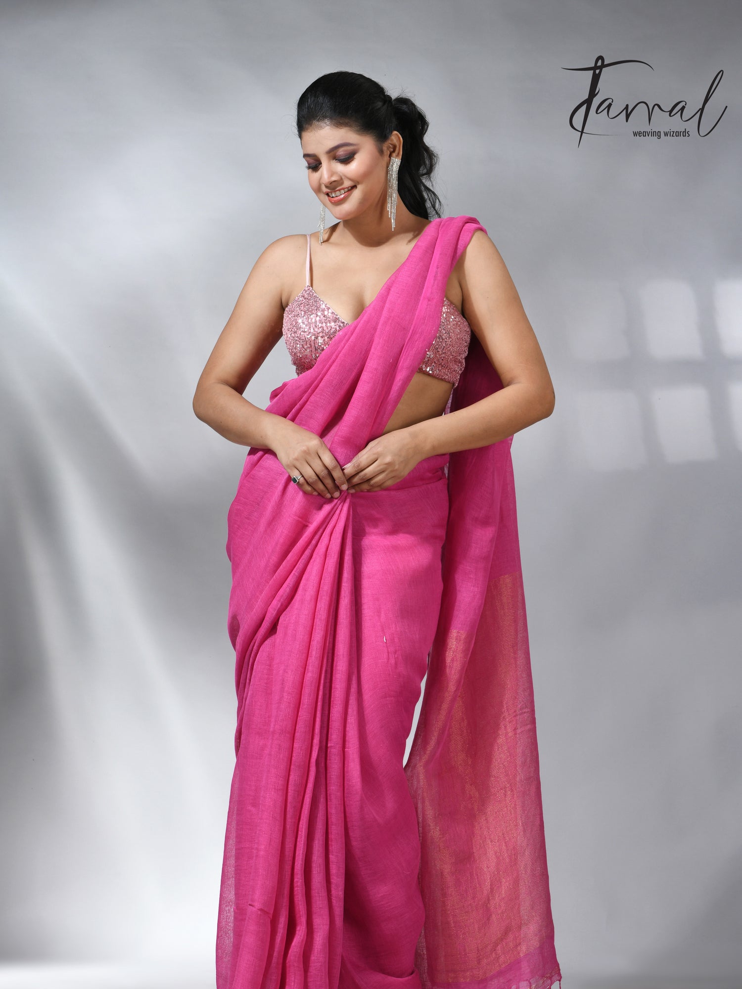 Hot pink with golden zari stripe pallu linen handloom saree