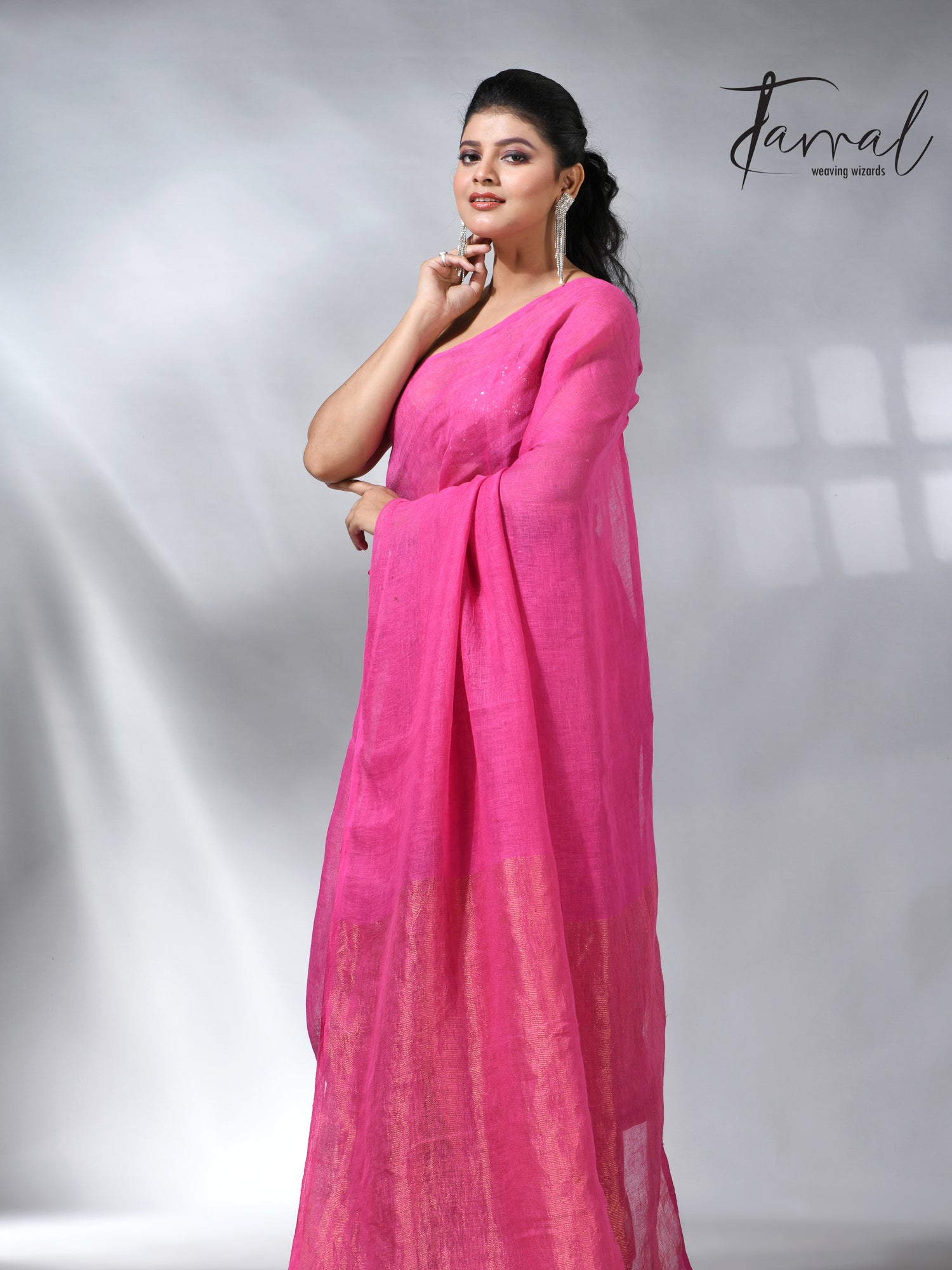 Hot pink with golden zari stripe pallu linen handloom saree
