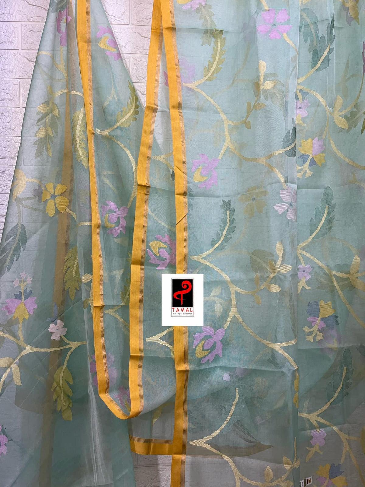 Light Firoza with yellow border allover hibiscus & other floral motifs handwoven jamdani saree in muslin silk - Tamal Boutique