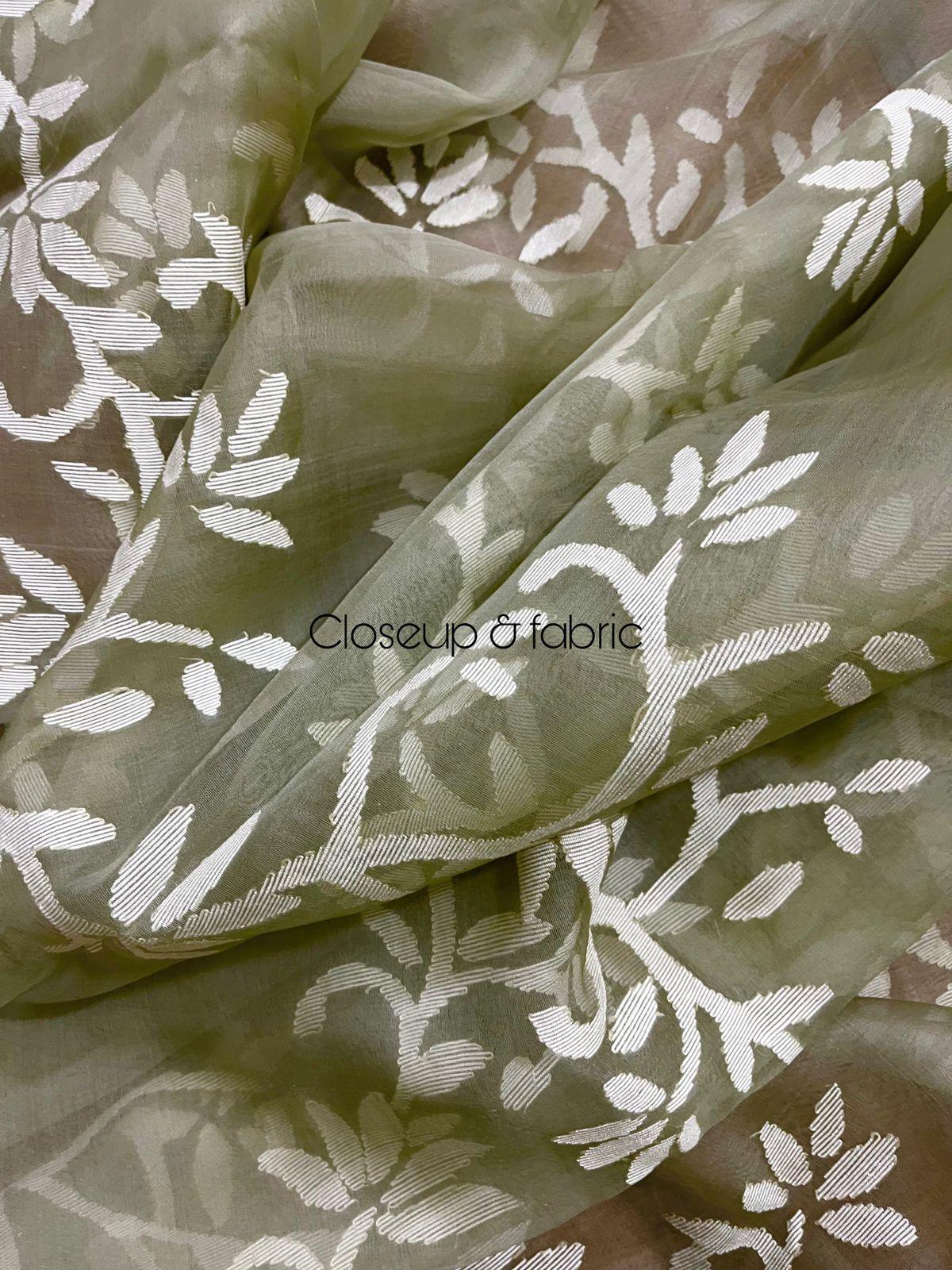 Light mint green with white allover floral handwoven jamdani in muslin silk saree - Tamal Boutique