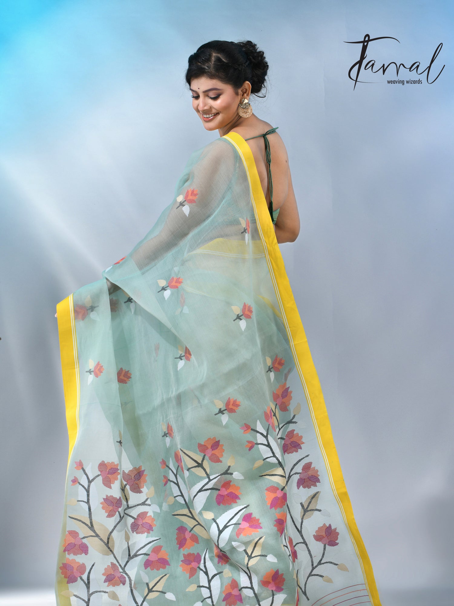 Light mint green muslin silk floral handwoven jamdani saree