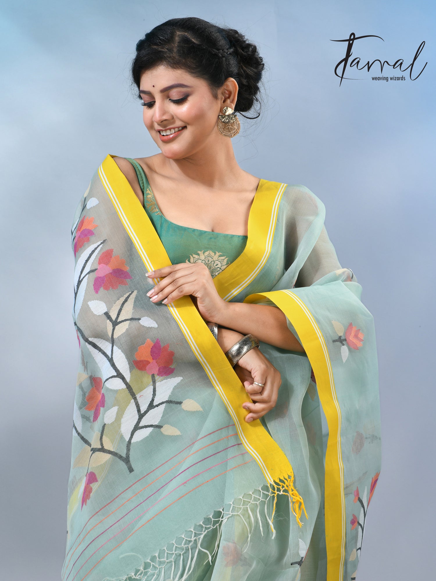 Light mint green muslin silk floral handwoven jamdani saree