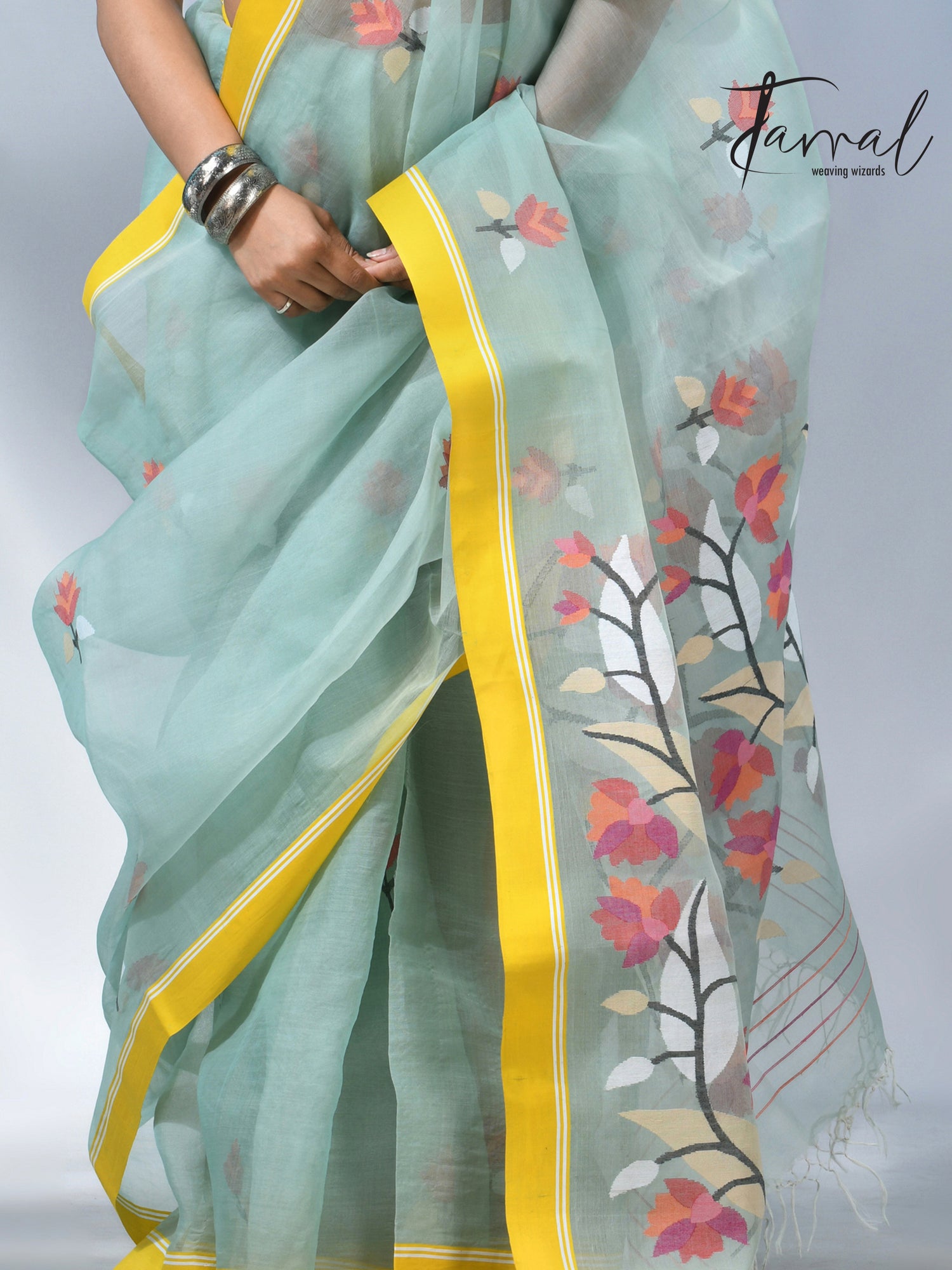 Light mint green muslin silk floral handwoven jamdani saree