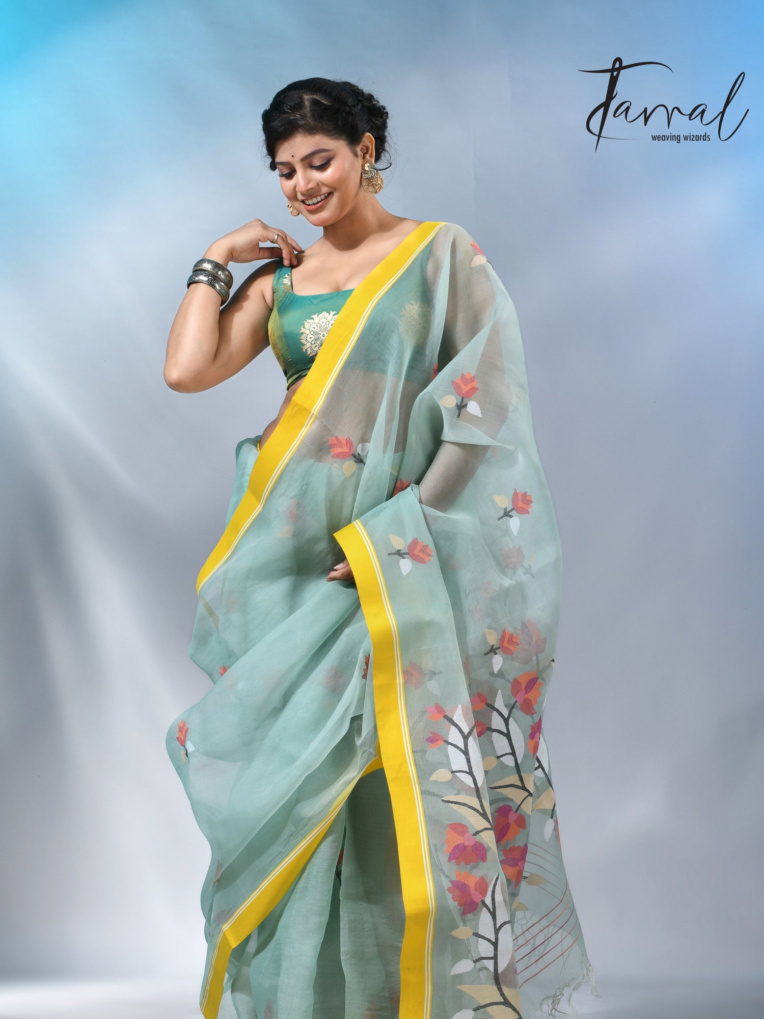 Light mint green muslin silk floral handwoven jamdani saree