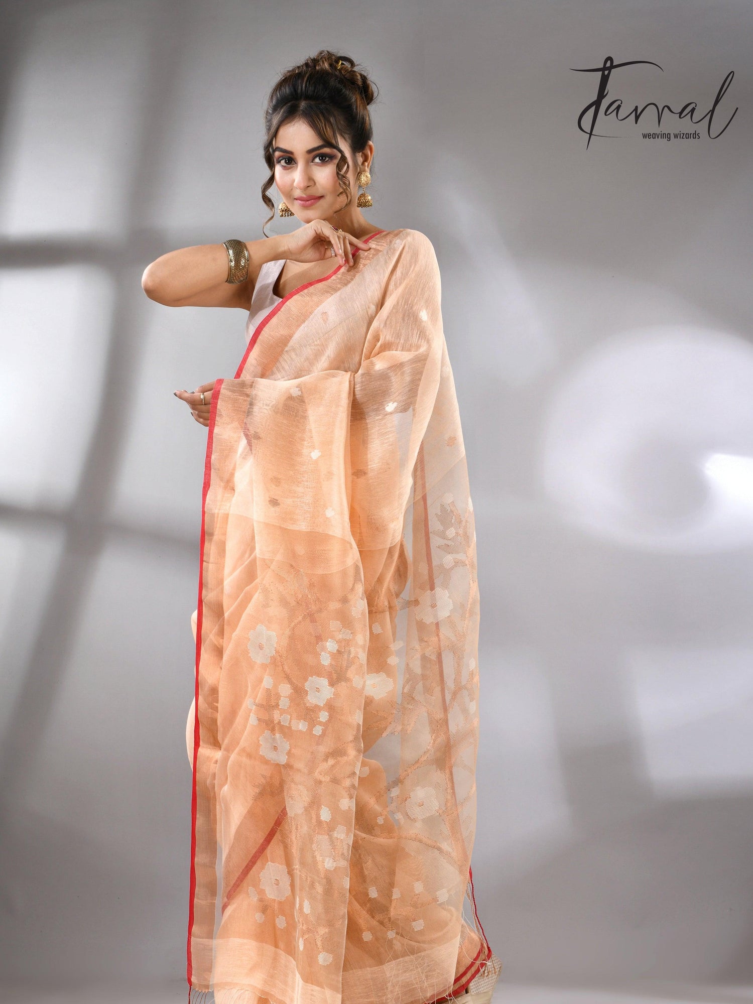Light_peach_zari_border_silk_linen_handwoven_jamdani_sarees_left2