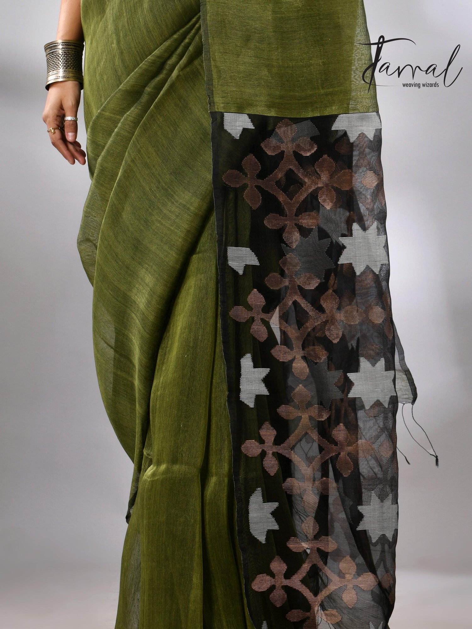 Linen handwoven jamdani saree in green and black star pallu botom